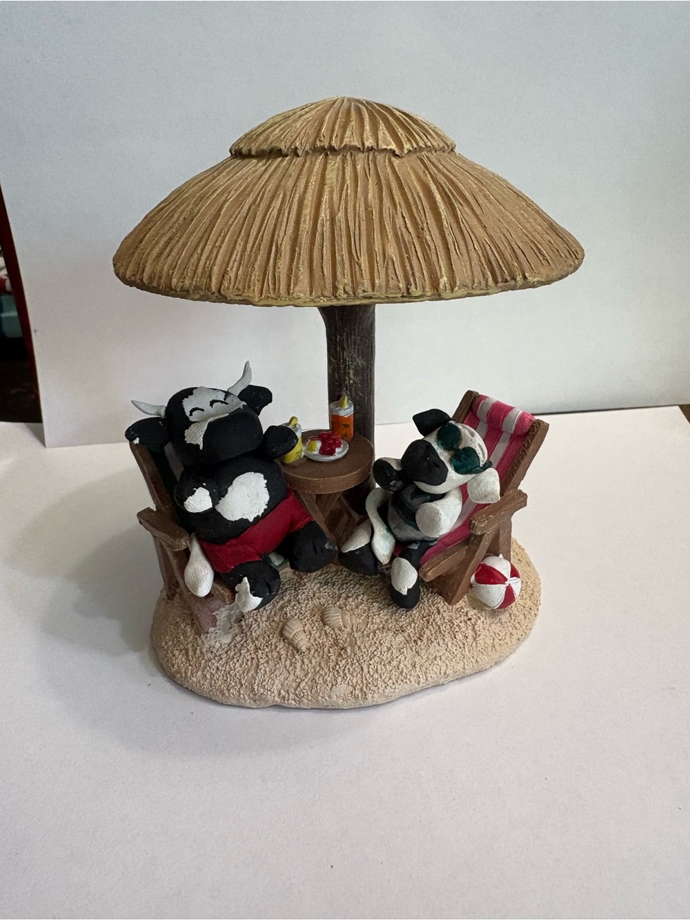 Beach Relaxing Cow Couple Figurine - Tan Umbrella, Black & White Cows